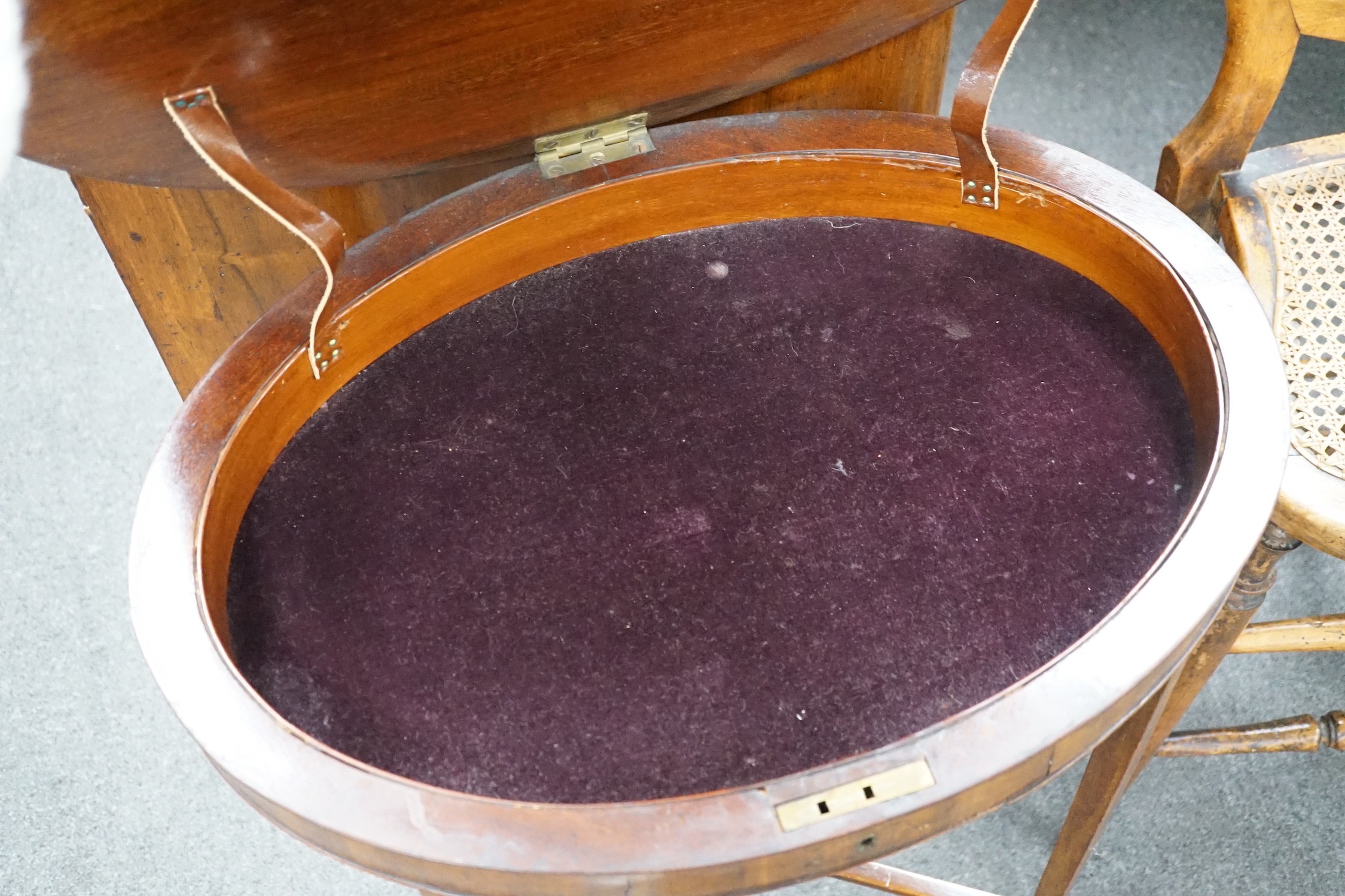 A Victorian caned beech child's correction chair and an Edwardian inlaid mahogany oval occasional table